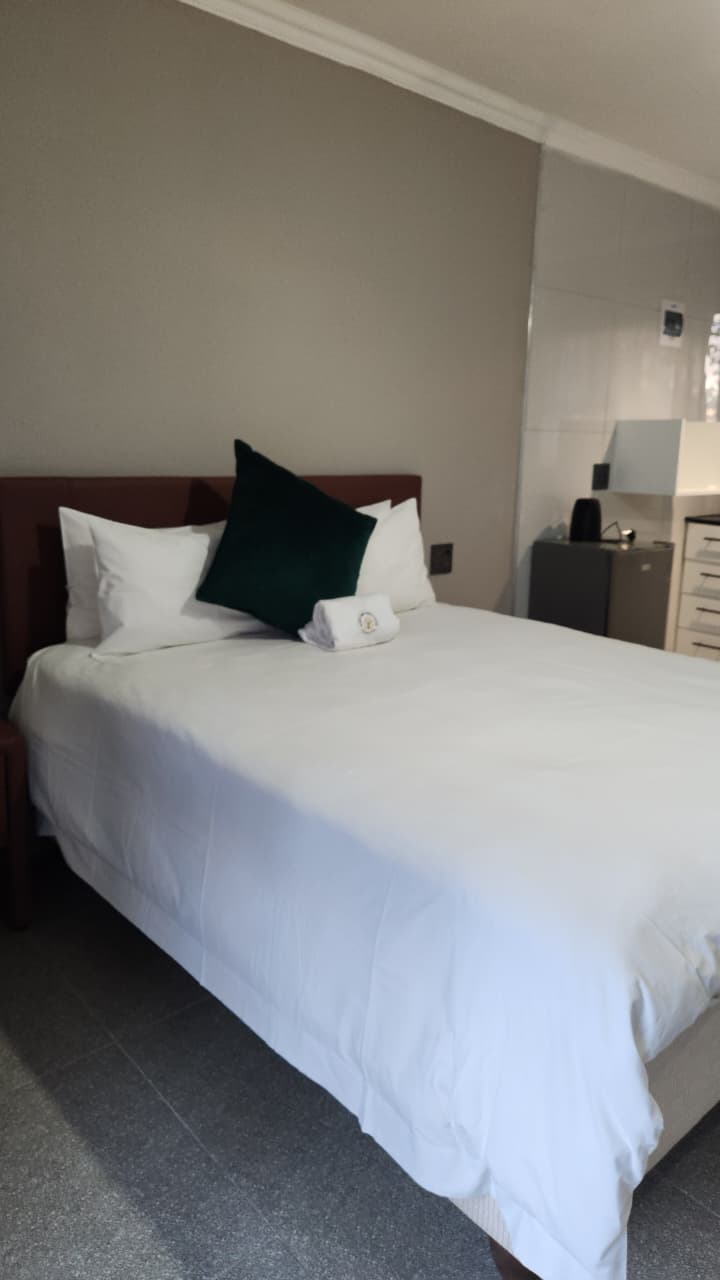 Beautifully made suite with green accent cushion