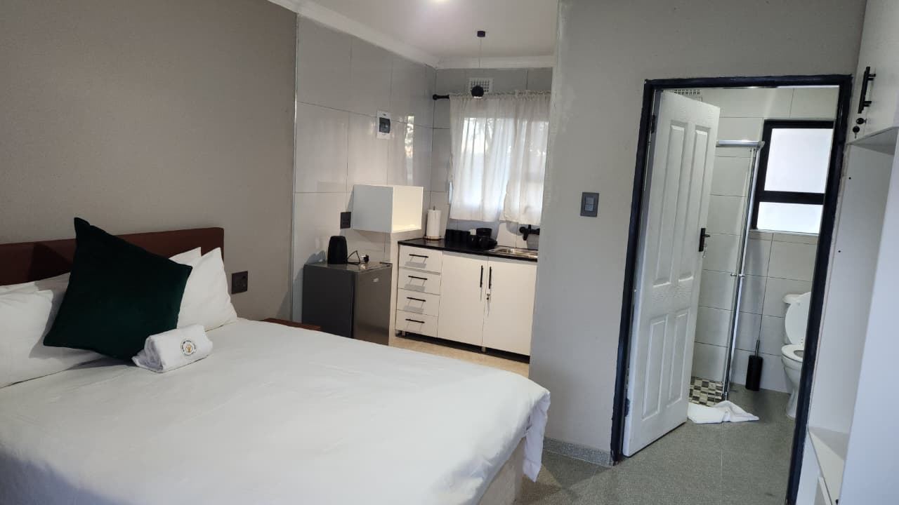 Suite 2 - full room with bathroom visible